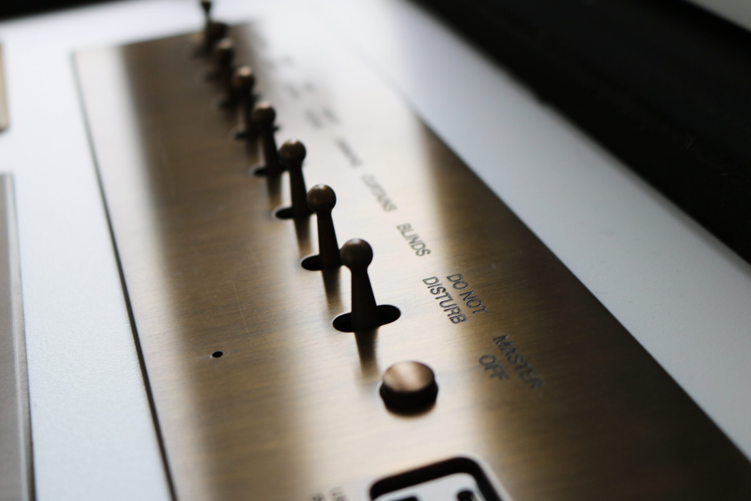 Laser Engraved Brass Switch Panel scaled - Laser Engraving Brass