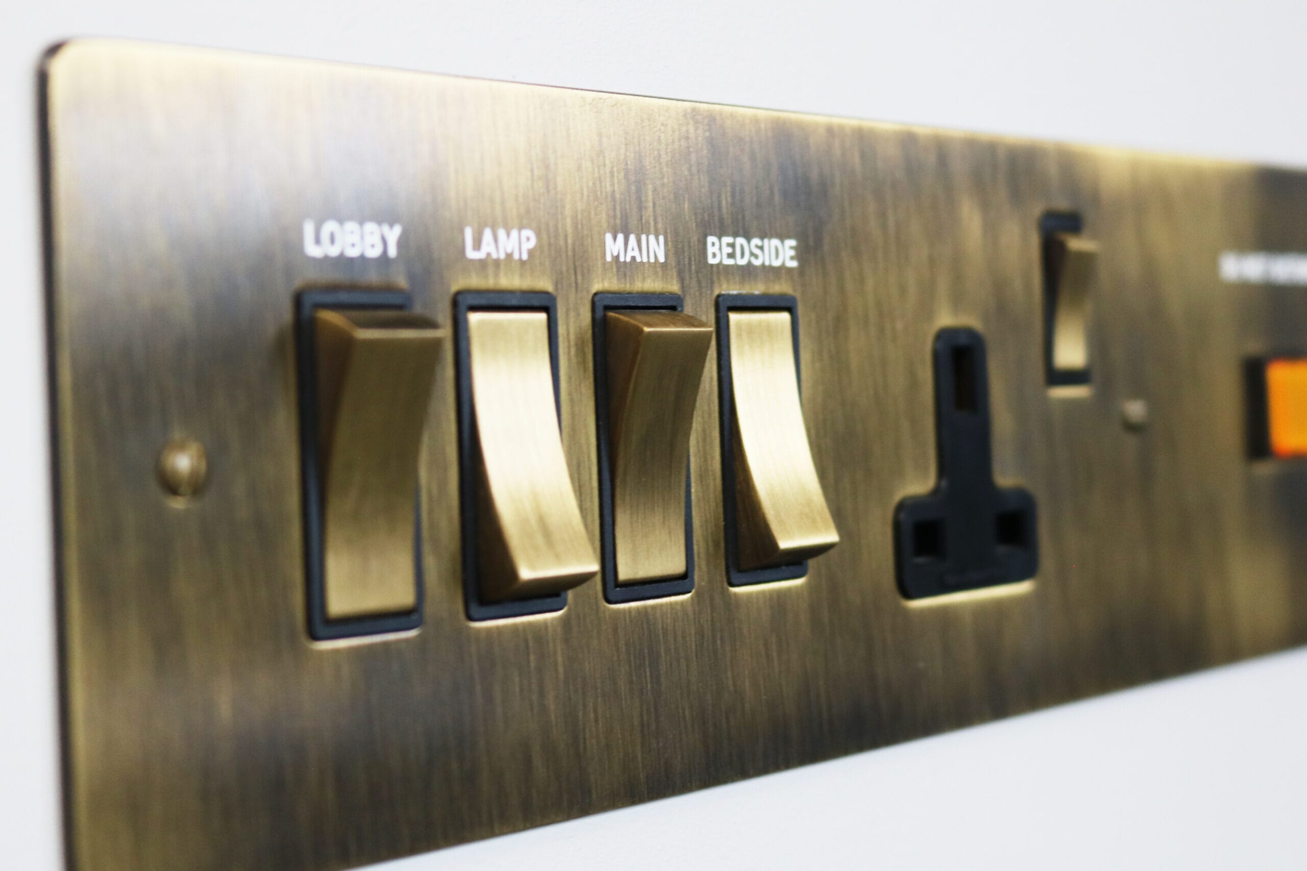 Laser Etched Brass Socket and Light Switch Panel scaled - metal laser engraver